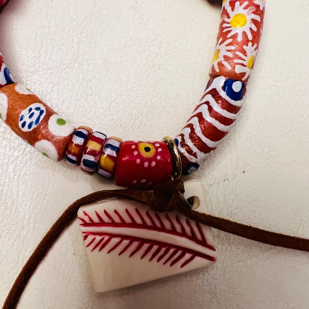 Bonedust Oklahoma. Hand carved Majong tile with African trade beads. Only one.